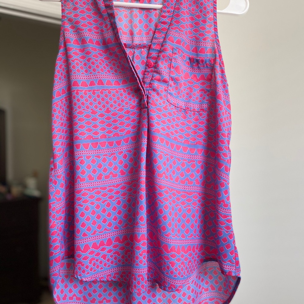 Pink and light blue sleeveless blouse
